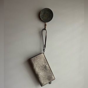 Glittery taupe/gold coach wristlet